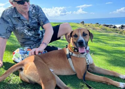 Hank hanging with his dad on a beach in Maui